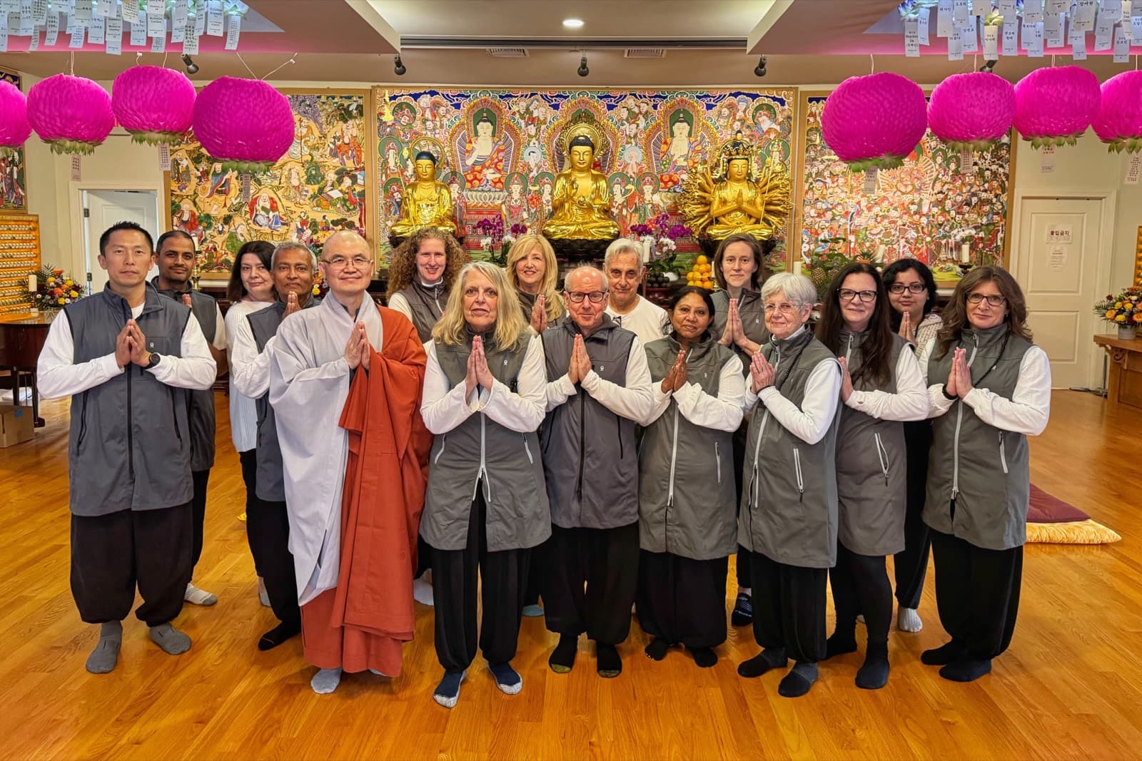 The Bodhicitta Sangha gathered with hands in añjali on Vesak at Bul Kwang Zen Center.